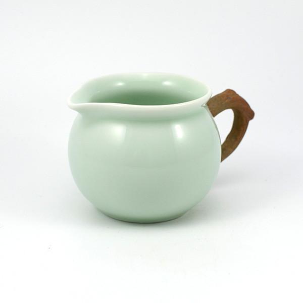 https://teaware.house/cdn/shop/products/43006-Classic-Celadon-Tea-Pitcher-with-Branch-Handle.jpg?v=1595138837